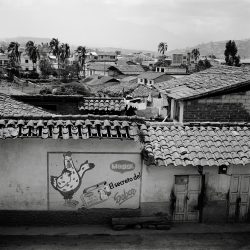 View of town of Otovalo, Ecuador with painted mural depicting the Maggi brand’s slogan “The Secret of the Flavor”.